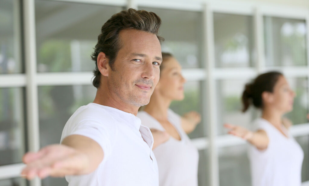 man with great skin care doing exercises