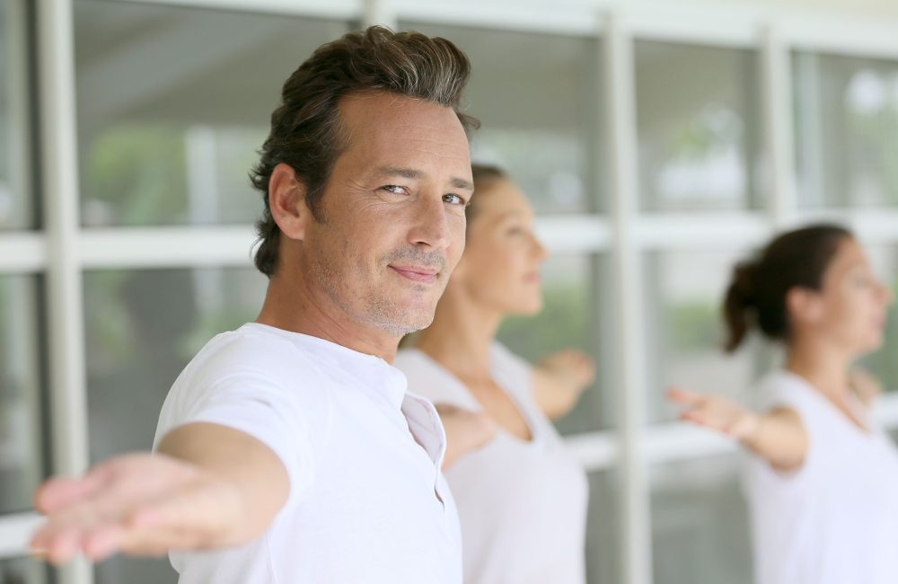 man with great skin care doing exercises
